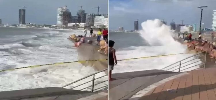 Mujer cae al mar tras derribarla una fuerte ola en el malecón de Mazatlán